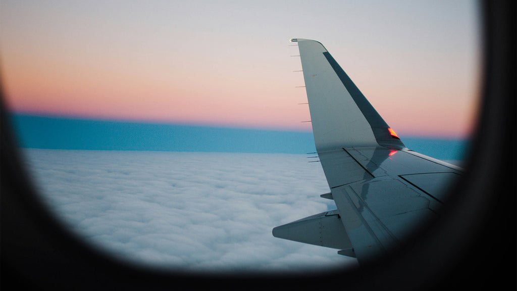 photo of a plane window by jessica-newendyke from UpSplashed
