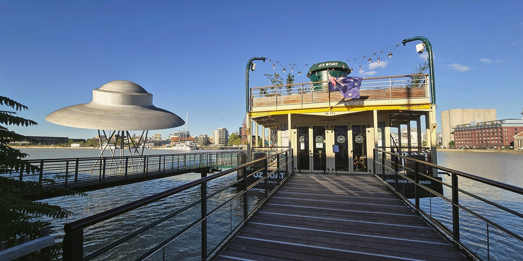 Spaceship sculpture and Oz Boat bar on the Garonne River in Bordeaux, France.