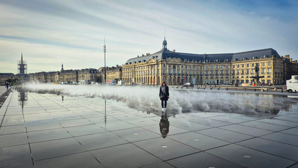 Reflection of the author at the Miroir d’eau in Bordeaux, France.